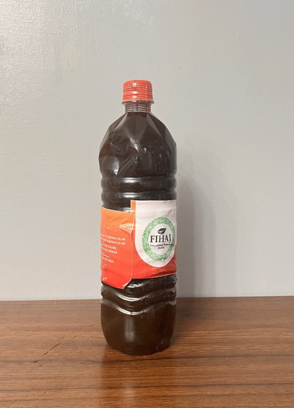 Plastic jar of bleached Nigerian palm oil by Fihaj Place in the UK