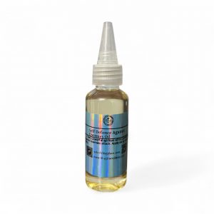text: “Bottle of Self Defence Against Enemies Oil with pointed applicator cap on a white background”