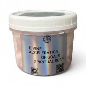 Container of ‘Divine Acceleration of Goals’ spiritual soap with holographic label and white lid.
